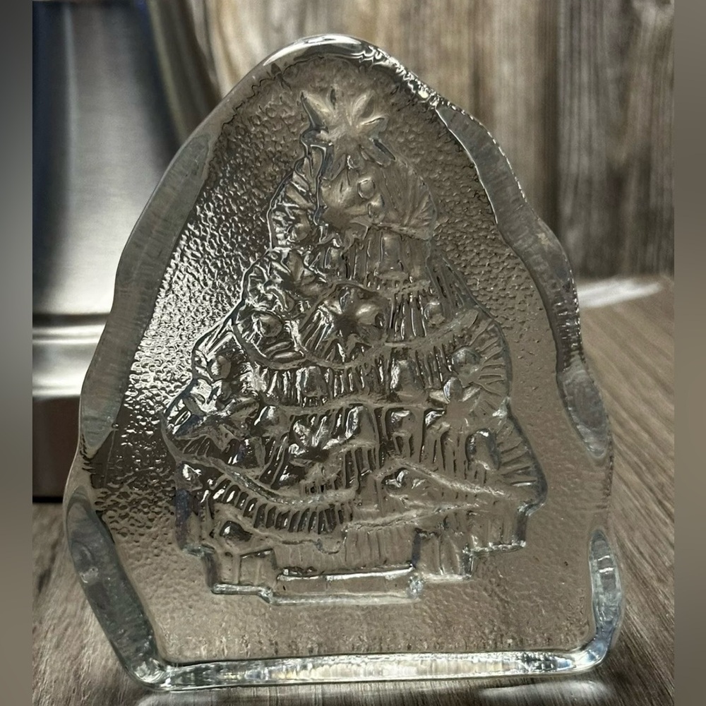 Glass Christmas paperweight.